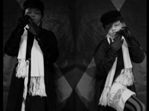 Stylised black and white picture of Bryn which mirrors them to left and right